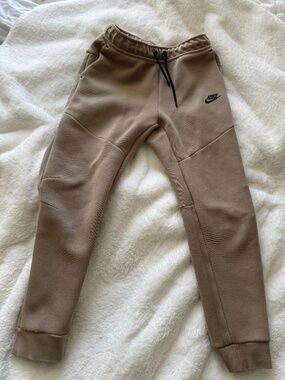 Tan Nike tech pants
